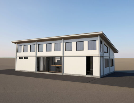 modern two-story building with large windows, set against a clear sky and flat landscape.